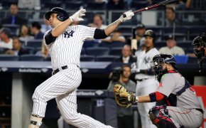 Yankees catcher Gary Sanchez hits a deep home run.