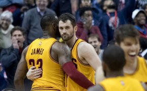 LeBron James and Kevin Love embrace