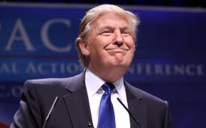 President Donald Trump smiles smugly