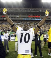Pittsburgh Steelers wide receiver Santonio Holmes celebrates following Pittsburgh's 27-23 win over the Arizona Cardinals in the NFL Super Bowl XLIII football game, Sunday, Feb. 1, 2009, in Tampa, Fla. Holmes caught the game-winning touchdown pass. (AP Photo/Amy Sancetta)