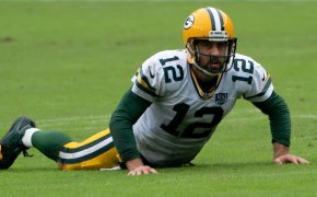 Aaron Rodgers on the field with the Green Bay Packers