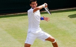 Novak Djokovic hits a return shot.