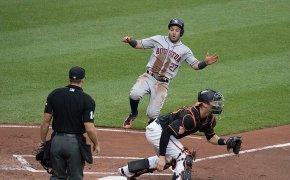 Jose ALtuve of the Houston Astros sliding into home