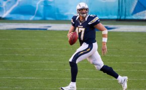 Quarterback Philip Rivers scrambles for the Los Angeles Chargers