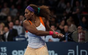 Serena Williams prepares to return a serve.