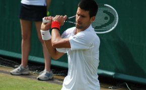 Novak Djokovic hitting a return shot