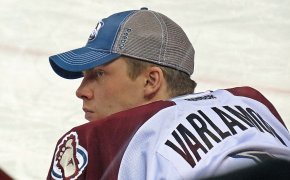 Avalanche goalie Semyon Varlamov looking on from the bench