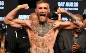Conor McGregor flexing during a weigh in.