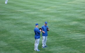 David Ross and Mike Borzell talking in the outfield