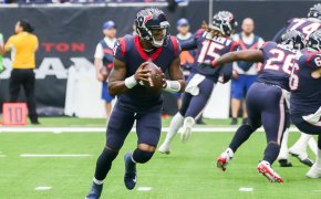 Houston Texans quarterback Deshaun Watson looks for an opening to pass the ball