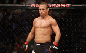 Urijah Faber paces the octagon.