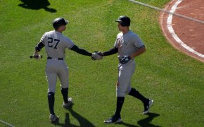 Stanton and Judge shake hands