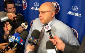 Islanders coach Barry Trotz answering questions from the media.