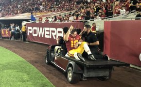 USC starting quarterback JT Daniels is cartered off the field against Fresno State