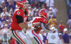 Jake Fromm taking a snap out of shotgun