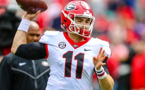 Jake Fromm throwing a pass