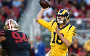 Jared Goff attempts a pass.