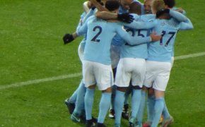 Manchester city celebrate a goal.