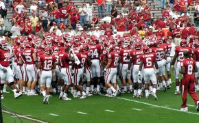 The Oklahoma Sooners in a team huddle