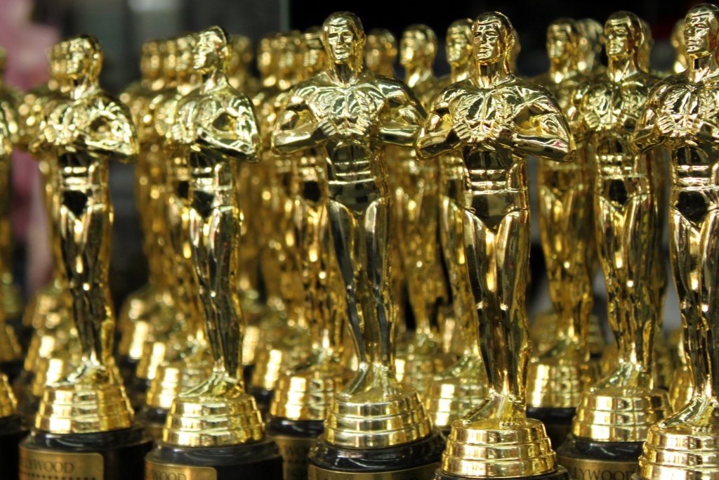 A table full of Oscar trophies