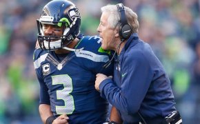 Russell Wilson and Pete Carroll celebrating