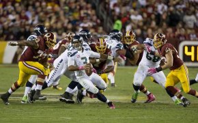 Russell Wilson bailing out of the pocket