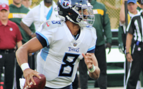 Titans QB Marcus Mariota on the move in the pocket.