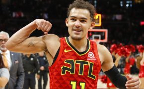 Trae Young flexing