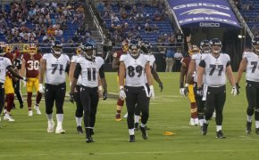 The Ravens on the field against Washington.