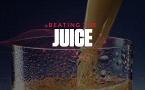beating the juice text overlay of juice being poured into a glass