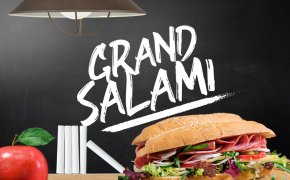 Grand salami written on betting 101 chalkboard with a sandwich