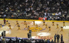 Lakers cheerleaders on the court.