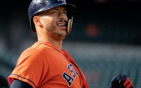 Carlos Correa watching fight of baseball he just hit