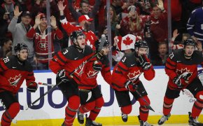 Canada celebrating a goal during the second period of a World Juniors game.