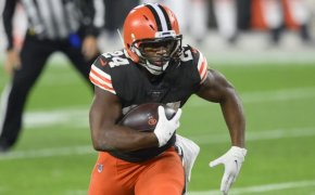 Cleveland Browns running back Nick Chubb running with the ball during a game.