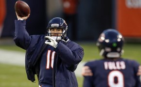 Mitchell Trubisky wearing jacket throwing passes