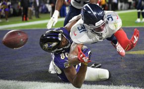 Baltimore Ravens wide receiver Miles Boykin misses a two-point conversion catch in a game with Tennessee Titans free safety Kevin Byard defending.