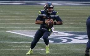 Russell Wilson dropping back to pass