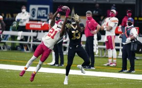 Kansas City Chiefs cornerback Bashaud Breeland breaking up a pass intended for a New Orleans Saints player
