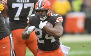 Cleveland Browns running back Nick Chubb running with the ball during a game.