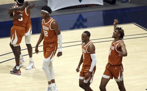 Texas Longhorns basketball players on the court
