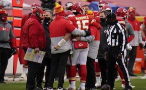Kansas City Chiefs quarterback Patrick Mahomes is helped off the field after getting injured during the divisional round game against the Cleveland Browns.