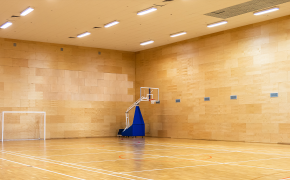 Basketball net in an empty gym