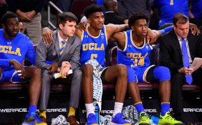 UCLA players sitting on the bench