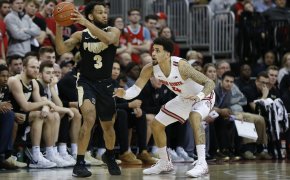 Purdue's Jahaad Proctor looks for an open pass as Ohio State's Duane Washington defends