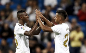 Vinicius and Rodrygo high-five on the pitch