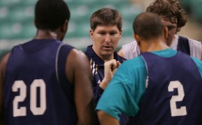 UNC Wilmington coach Brad Brownell talks with his players