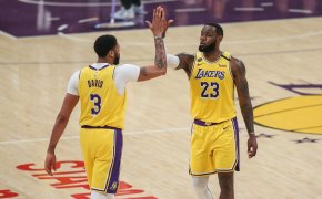 Anthony Davis and LeBron James hi-five each other