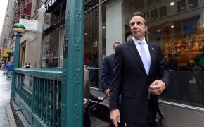 Governor Andrew Cuomo coming out of the subway.