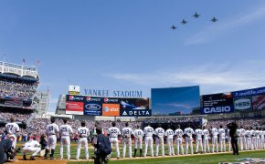 Players standing for anthem at Yankee Stadium